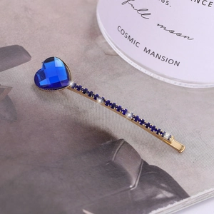 Vintage gold hair pin with emerald-cut blue crystal heart and glittering rhinestones