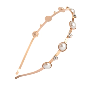 Serre-tête élégant en or rose avec perles blanches et cristaux étincelants sur métal