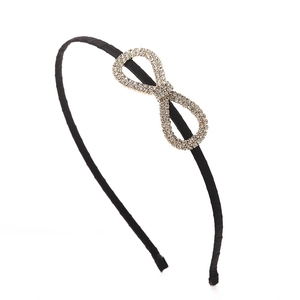 Elegant black satin headband featuring a sparkling rhinestone bow and infinity symbol