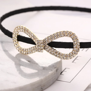 Elegant black headband with sparkling infinity symbol rhinestone design for women
