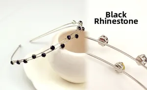 Detail of double-row silver headband with sparkling black rhinestones in claw settings