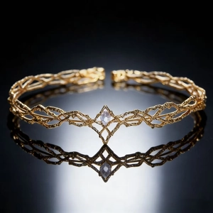 Elegant gold elven tiara featuring intricate hollow vines and a diamond-shaped rhinestone