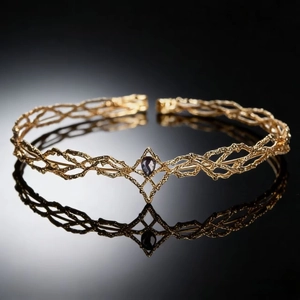 Golden vine style fantasy crown featuring a drop-shaped deep purple gemstone inlay