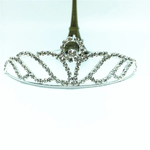 Sparkling silver rhinestone bridal tiara with elegant curved design for weddings and parties