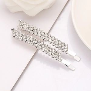 Ensemble de barrettes en métal argenté avec strass brillants et décorations florales