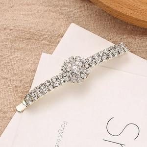 Elegant rhinestone flower hair clip with silver alloy base and sparkling crystals