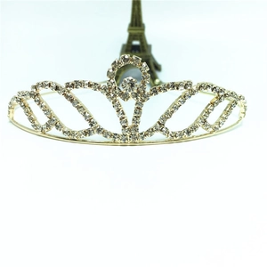 Elegant gold bridal tiara with sparkling rhinestones and hollow wavy design for weddings