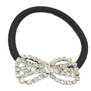 Minimalist black elastic hair tie featuring a sparkling silver rhinestone bow decoration