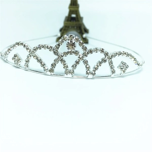 Macro shot of silver bridal tiara with sparkling crystal rhinestones and heart-shaped patterns