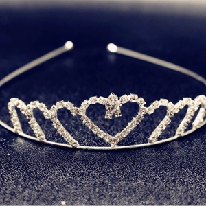 Sparkling silver crystal crown headband with heart designs for bridal or wedding events