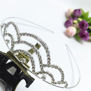 Silver rhinestone bridal crown with multi-layer wave design and square crystal accents