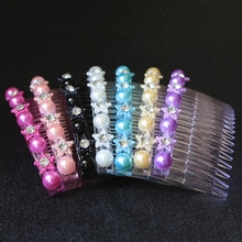 Detail of colorful resin hair combs with star rhinestones and imitation pearls