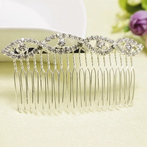 Eleganter Brauthaarkamm mit silberner Basis und funkelnden Strass-Augenmotiven