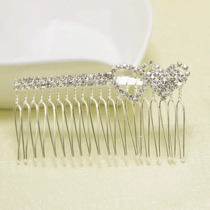 Elegant silver heart bridal hair comb featuring brilliant rhinestones and double heart design
