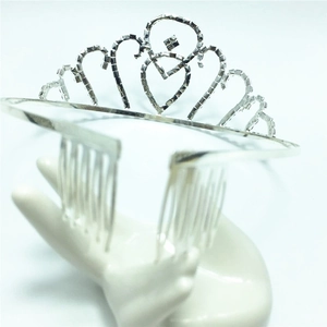 Silver heart-shaped tiara hair comb with sparkling white rhinestones for bridal hairstyle