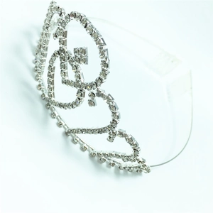 Elegant silver crown tiara with heart patterns and sparkling rhinestones for hair