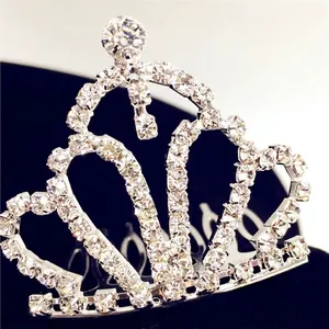 Elegant silver crown hair comb for kids featuring sparkling rhinestones on black velvet