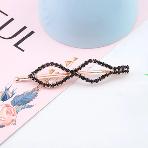 Elegant rose gold hair clip with black diamonds in a double rhombus hollow design