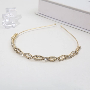 Serre-tête fin doré élégant avec motifs de diamants ondulés et cristaux brillants
