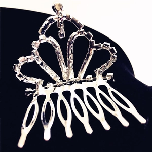 Sparkling rhinestone crown hair comb with silver metal base and crystal accents