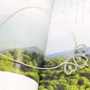 Silver crown choker with sparkling rhinestones on a minimalist metal neckband
