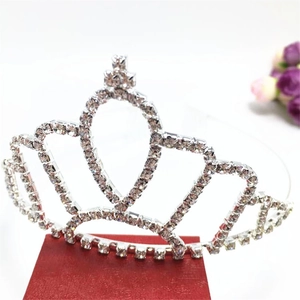 Elegant silver tiara with sparkling crystal rhinestones and heart-shaped center crown