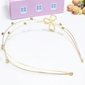 Elegant gold double-layered rhinestone leaf headband with clover accent for women