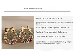 Close-up of bowknot earrings with multicolored crystals and gold-tone metal base