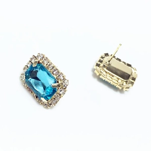 Elegant rectangle sky blue gemstone stud earrings with gold plating and white crystal halo