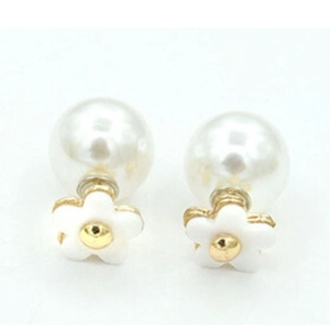 Elegant white pearl flower stud earrings with gold center accents on a clean background