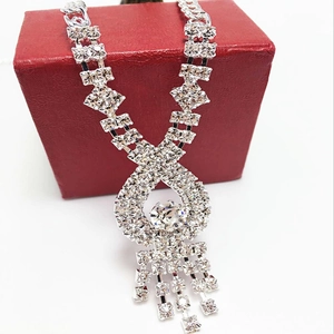 Elegant silver rhinestone choker necklace with square crystals and large round pendant