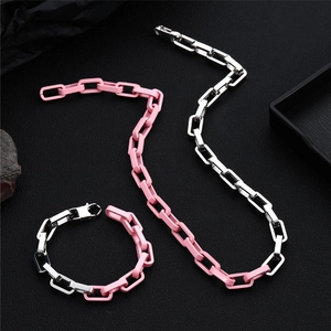 Halskette und Armband Set aus poliertem Edelstahl mit rosa und silbernen Gliedern