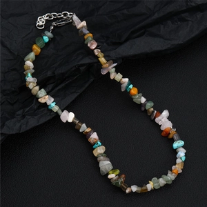 Detailed shot of multi-color natural gemstone chips necklace with adjustable metal clasp