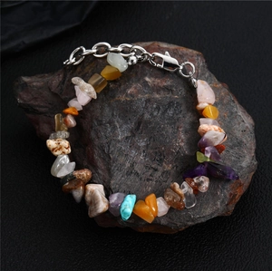 Detailed close-up of Bohemian handmade necklace with colorful irregular natural stones