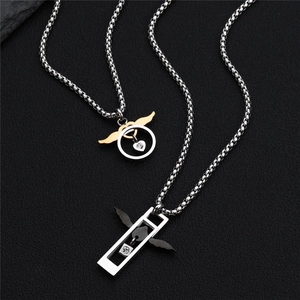 Couples titanium steel necklaces set with heart pendants and decorative angel wings