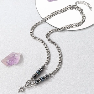 Macro shot of titanium steel link necklace with iridescent beads and star pendant