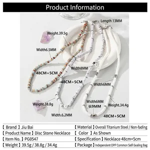 Three colorful jasper and pearl beaded necklaces with titanium steel pendants on white ceramic