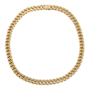Détails d'un bracelet gourmette dorée sertie de zircons brillants de style hip-hop