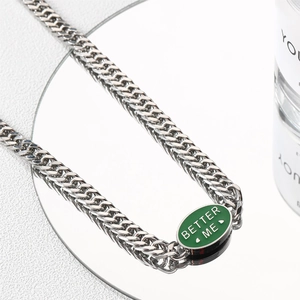 Cuban chain necklace with green enamel Better Me pendant in polished titanium steel