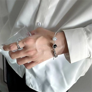 Minimalist cat eye stone titanium steel bracelet with a polished silver liquid metal ring
