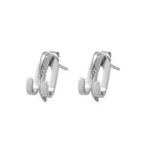 Minimalist silver interlocking drop claw stud earrings with polished metallic finish