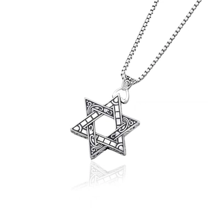 Close-up of retro double-sided hexagram pendant on box chain with oxidized finish