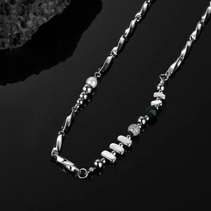 Silver Mobius necklace with pearls, green gemstones, and micro-pave balls for men