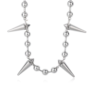 Detailed close-up of a silver ball chain necklace featuring four metallic cone spike pendants