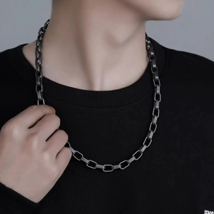 Men's hip-hop titanium steel twill chain necklace shown on model for street style look