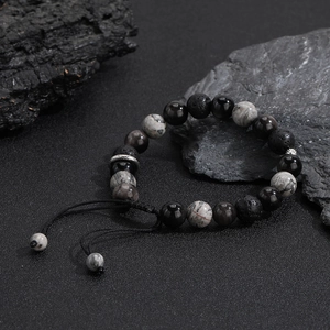 Mens obsidian and lava stone beaded bracelet with adjustable woven rope and silver charm