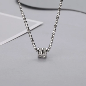 Polished titanium steel cylinder pendant necklace with double row cubic zirconia stones