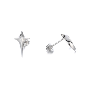 Macro shot of silver four-pointed star stud earrings with polished metal finish