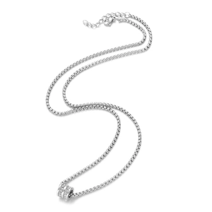 Detailed close-up of a silver titanium steel necklace with a diamond-studded cylinder pendant