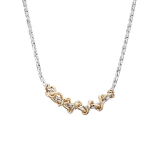 Two-tone mixed metal chain necklace with gold braided link center on silver base